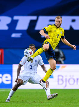 Presnel Kimpembe of France and Sebastian Larsson of Sweden
