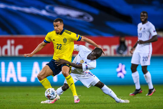 Robin Quaison of Sweden and N'Golo Kanté of France