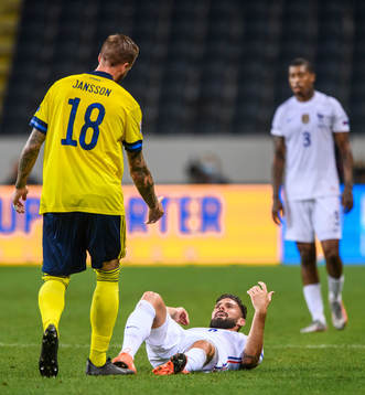 Pontus Jansson of Sweden and Olivier Giroud of France