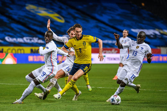 Albin Ekdal of Sweden against Ferland Mendy and N'Golo