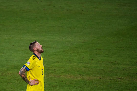 Pontus Jansson of Sweden looks dejected