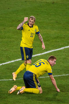 John Guidetti of Sweden and Dejan Kulusevski of Sweden