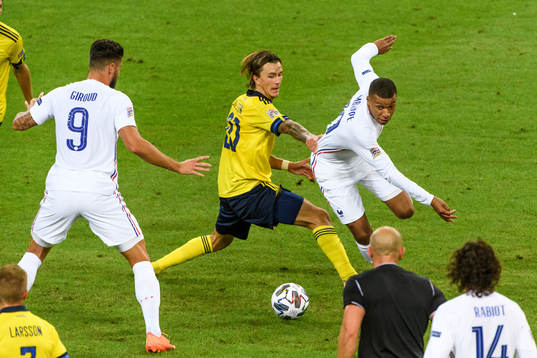 Kristoffer Olsson of Sweden and Kylian Mbappé of France