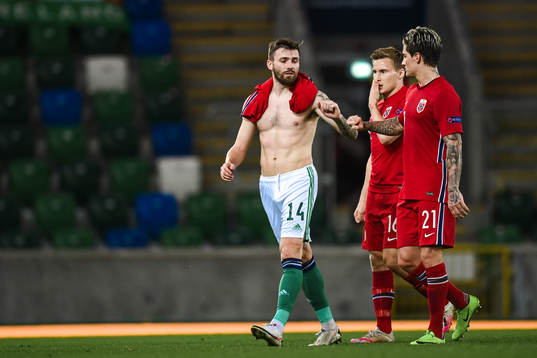 Stuart Dallas of Northern Ireland with Jonas Svensson and