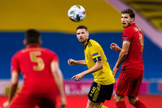 Marcus Berg of Sweden and Ruben Dias of Portugal