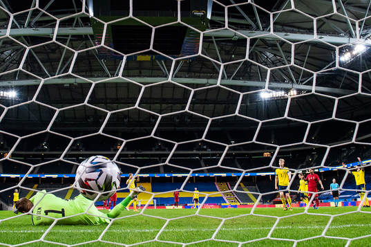Cristiano Ronaldo of Portugal scores 0-2 behind goalkeeper