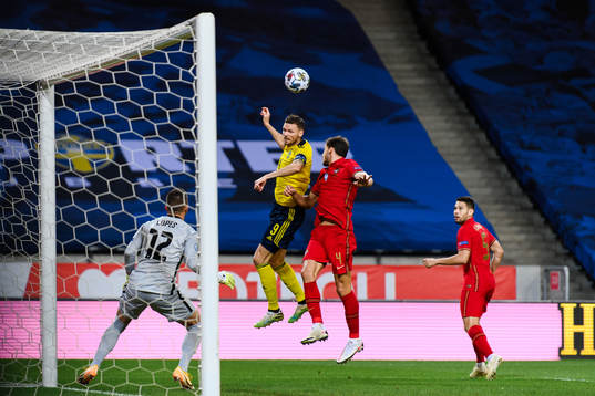 Marcus Berg of Sweden against goalkeeper Anthony Lopes and