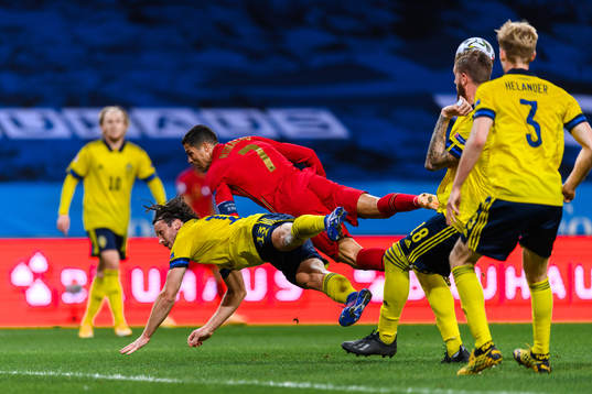 Gustav Svensson of Sweden and Cristiano Ronaldo of Portugal