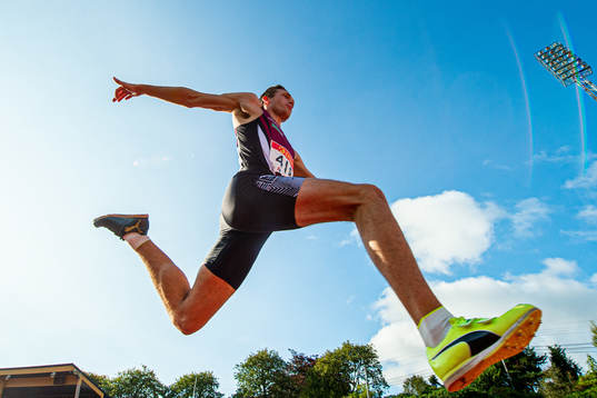Henrik Flåtnes competes to win the men's triple jump final