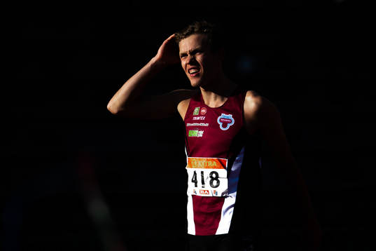 Henrik Flåtnes competes to win the men's triple jump final