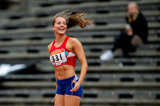 Telma Eid celebrates competing in the women's triple jump