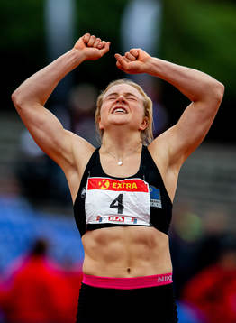 Henriette Jæger celebrates winning the women’s 200 meter
