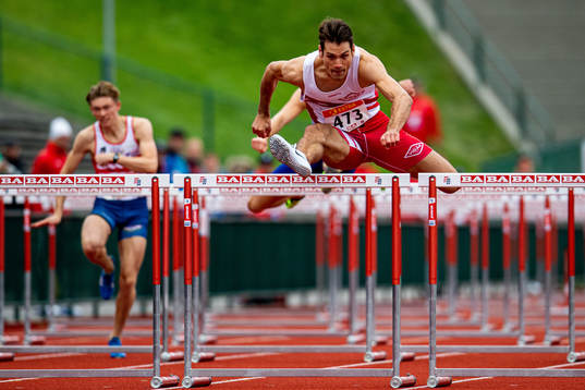 Vladimir Vukicevic competes to win the men’s 110 meter