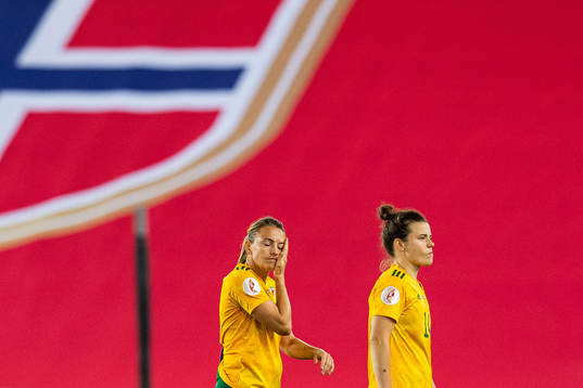 Kayleigh Green and Hayley Ladd of Wales look