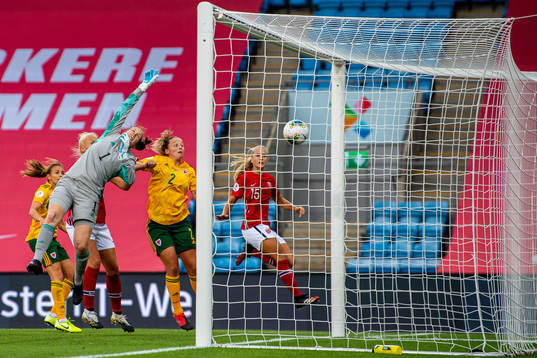 Goalkeeper Laura O'Sullivan of Wales lets in the 1-0 goal