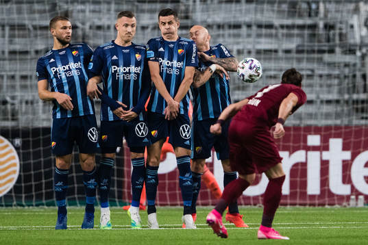 Adrian Paun of CFR Cluj with a freekick past Jesper