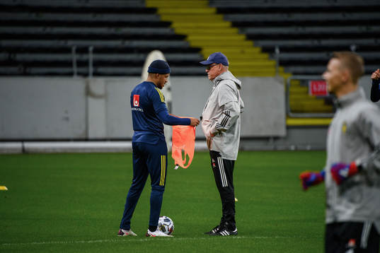 Martin Olsson and head coach Janne Andersson of the Swedish