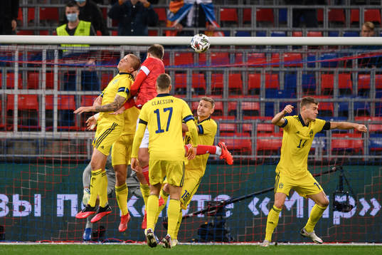 Aleksandr Sobolev of Russia scores the 1-2 goal