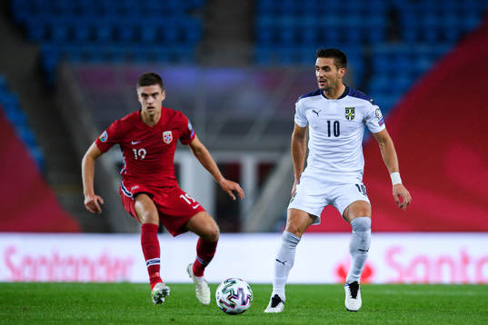 Markus Henriksen of Norway and Dusan Tadic of Serbia