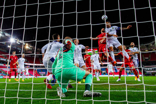 Tore Reginiussen of Norway and Aleksandar Kolarov of Serbia