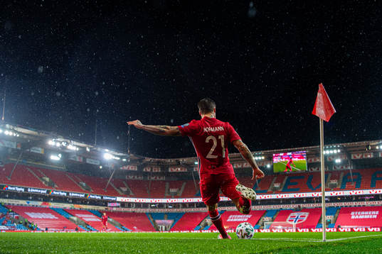 Mathias Normann of Norway takes a corner kick