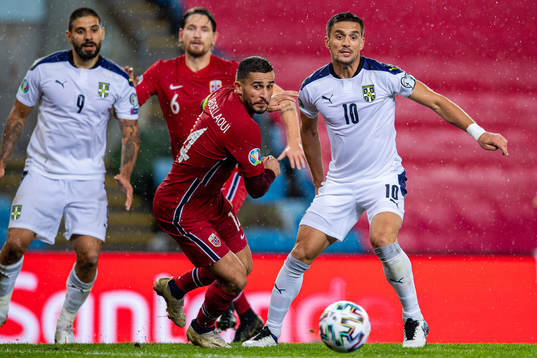 Omar Elabdellaoui of Norway and Dusan Tadic of Serbia