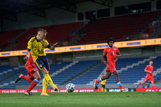 Jesper Karlsson of Sweden scores the 3-0 goal