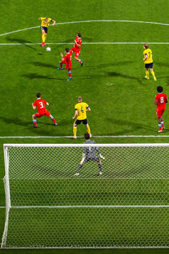 Felix Beijmo of Sweden scores 4-0 behind goalkeeper Tom