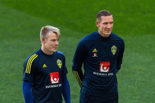 Goalkeepers Isak Pettersson and Robin Olsen of the Swedish