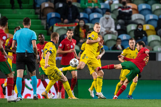 Bernardo Silva of Portugal and Viktor Claesson of Sweden