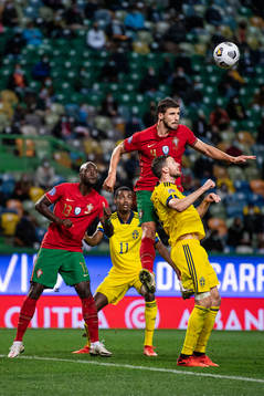 Danilo and Ruben Dias of Portugal against Alexander Isak