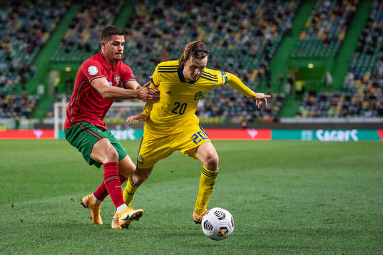 André Silva of Portugal and Kristoffer Olsson of Sweden