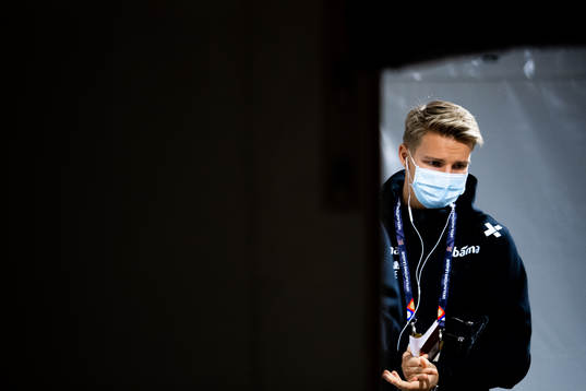 Martin Ødegaard of Norway arrives wearing a face mask