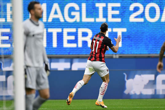 Zlatan Ibrahimovic of Milan celebrates scoring his second