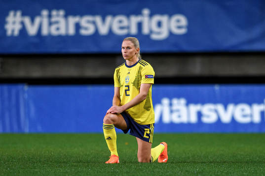 Jonna Andersson of Sweden kneels in support of the "Black