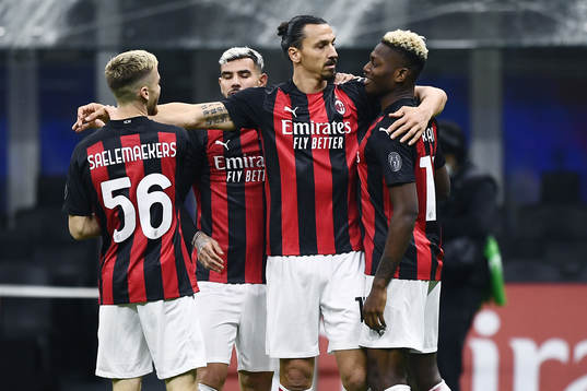 Zlatan Ibrahimovic of Milan celebrate with teammates