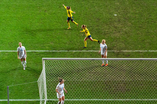 Kosovare Asllani and Anna Anvegård of Sweden celebrate