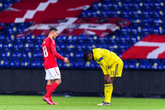Alexander Bah of Denmark and Alexander Isak of Sweden
