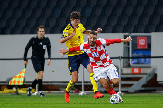 Mikael Lustig of Sweden and Nikola Vlasic of Croatia