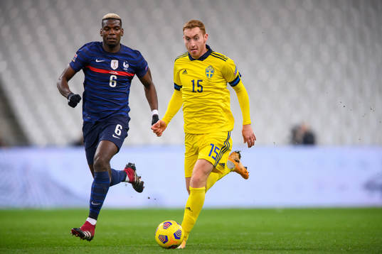 Paul Pogba of France and Dejan Kulusevski of Sweden