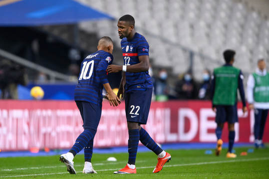 Marcus Thuram and Kylian Mbappé of France