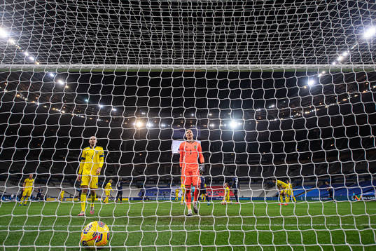 Marcus Danielson and goalkeeper Robin Olsen of Sweden look