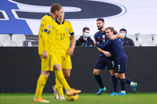 Olivier Giroud and Antoine Griezmann of France celebrate