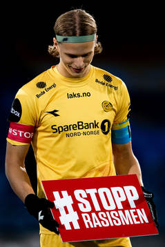 Ulrik Saltnes of Bodø/Glimt with a sign that reads