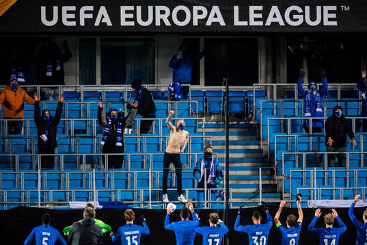 Spectators in the stands celebrates