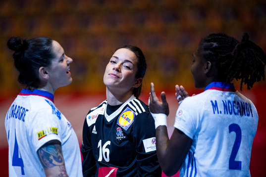 Alexandra Lacrabere , goalkeeper Cleopatre Darleux and