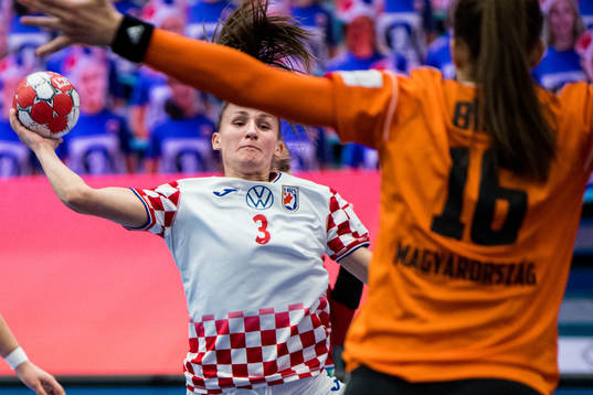 Paula Posavec of Croatia against goalkeeper Blanka Biro of