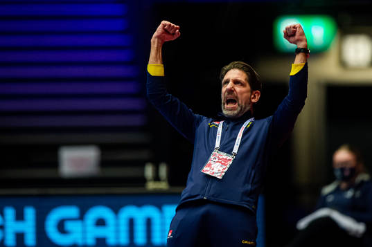 Tomas Axner, head coach of Sweden celebrates