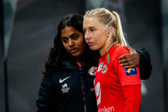 Anitra Lid and Thea Bjelde of Arna-Bjørnar look dejected