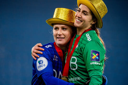 Catherine Bott and goalkeeper Hannah Grace Seabert of